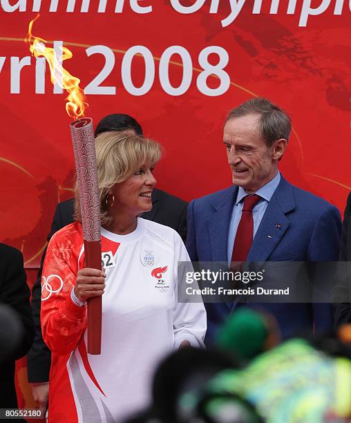 French former olympic champions, skier Jean-Claude Killy , and French former olympic champion, swimmer Christine Caron attend the Beijing Olympics...