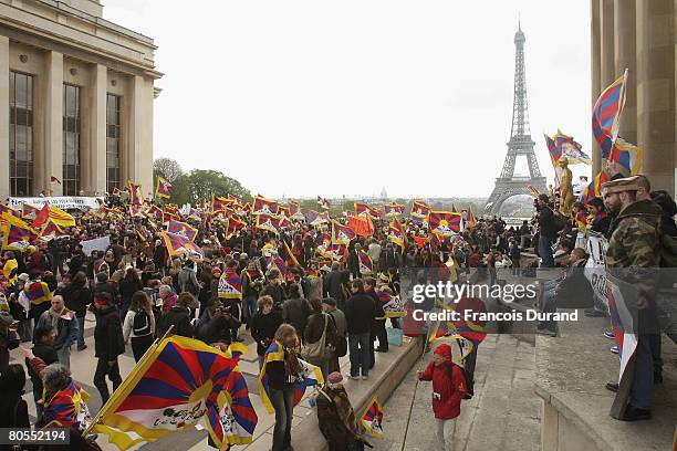 Pro-Tibet protestors demonstrate at the Trocadero place opposite the Eiffel tower during the Beijing Olympics flame relay amid high security, on...