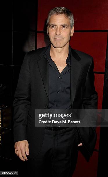 George Clooney attends the Harpers Bazaar dinner for George Clooney hosted by editor Lucy Yeomans, at L'Atelier de Joel Robuchon on April 7, 2008 in...