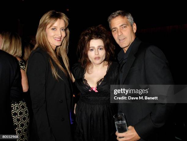Natasha McElhone, Helena Bonham Carter and George Clooney attend the Harpers Bazaar dinner for George Clooney hosted by editor Lucy Yeomans, at...