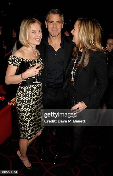 Mariella Frostrup, George Clooney and Lucy Yeomans attend the Harpers Bazaar dinner for George Clooney hosted by editor Lucy Yeomans, at L'Atelier de...