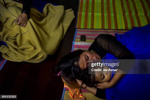Relatives of the victims of drug related killings taking shelter inside a church on February 17, 2017 in Manila, Philippines. The Catholic Bishop's...