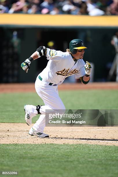 Travis Buck of the Oakland Athletics bats during the game against the Cleveland Indians at the McAfee Coliseum in Oakland, California on April 6,...