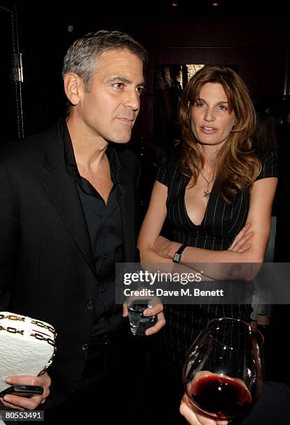 George Clooney and Jemima Khan attend the Harpers Bazaar dinner for George Clooney hosted by editor Lucy Yeomans, at L'Atelier de Joel Robuchon on...