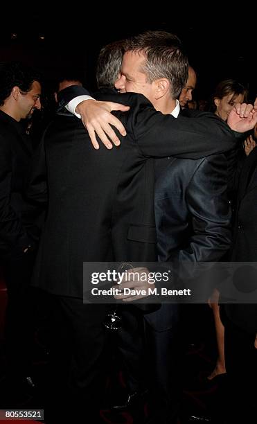 George Clooney and Matt Damon attend the Harpers Bazaar dinner for George Clooney hosted by editor Lucy Yeomans, at L'Atelier de Joel Robuchon on...