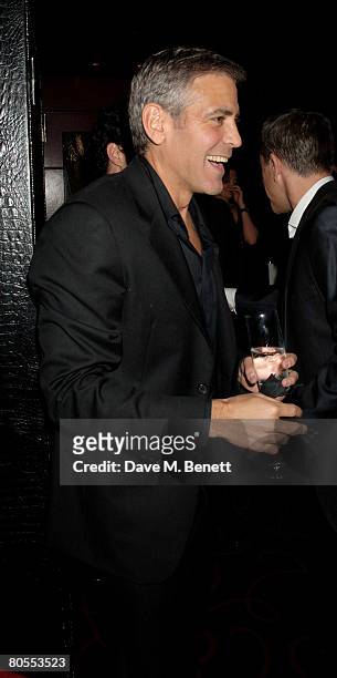 George Clooney attends the Harpers Bazaar dinner for George Clooney hosted by editor Lucy Yeomans, at L'Atelier de Joel Robuchon on April 7, 2008 in...