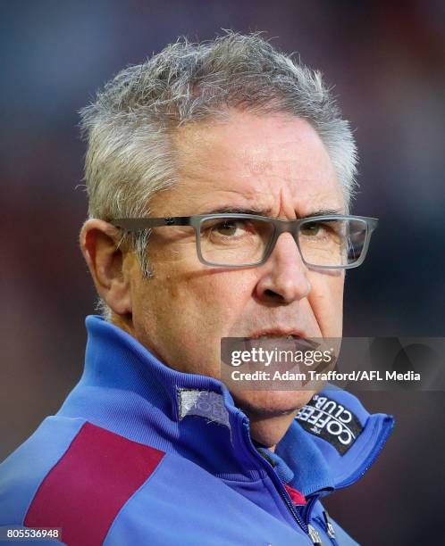 Chris Fagan, Senior Coach of the Lions addresses his players during the 2017 AFL round 15 match between the Essendon Bombers and the Brisbane Lions...