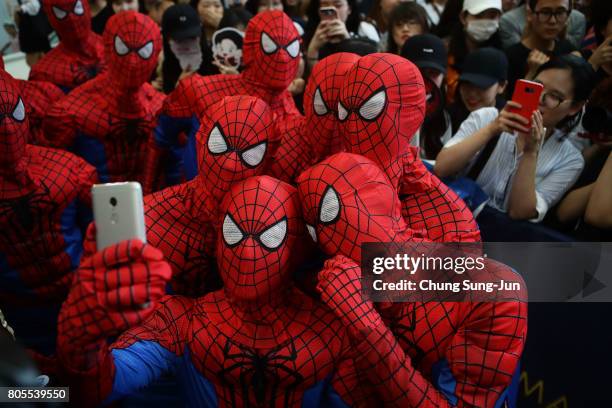 South Koreans wear Spider-Man cloths during the 'Spider-Man: Homecoming' Seoul Premiere at Yeongdeunpo Times Square on July 2, 2017 in Seoul, South...