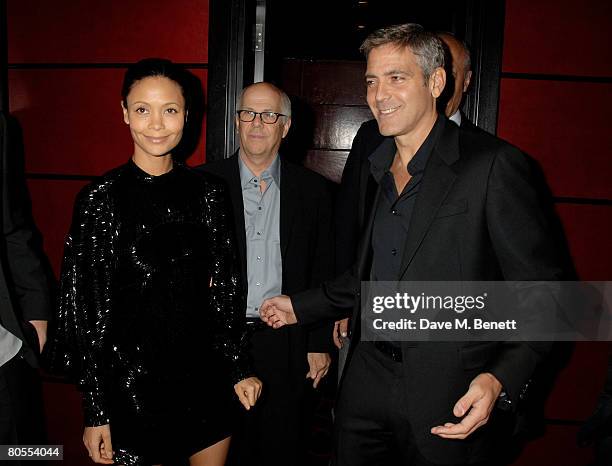 Thandie Newton and George Clooney attend the Harpers Bazaar dinner for George Clooney hosted by editor Lucy Yeomans, at L'Atelier de Joel Robuchon on...