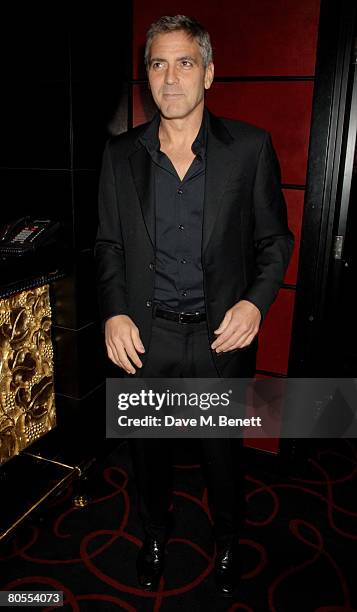 George Clooney attends the Harpers Bazaar dinner for George Clooney hosted by editor Lucy Yeomans, at L'Atelier de Joel Robuchon on April 7, 2008 in...