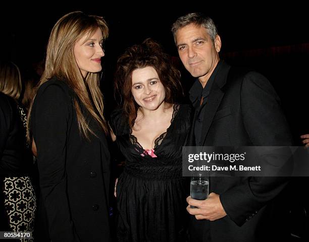 Natasha McElhone, Helena Bonham Carter and George Clooney attend the Harpers Bazaar dinner for George Clooney hosted by editor Lucy Yeomans, at...