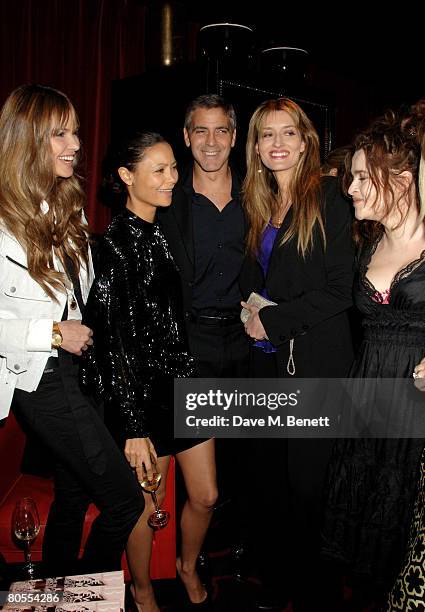 Elle Macpherson, Thandie Newton, George Clooney, Natasha McElhone and Helena Bonham Carter attend the Harpers Bazaar dinner for George Clooney hosted...