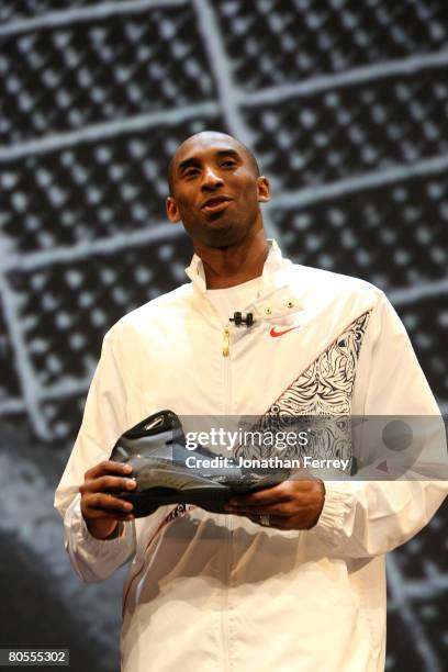 Kobe Bryant of the Los Angeles Lakers poses with the newly unveiled Nike Hyperdunk shoe at the Nike Beijing 08 Innovation Summit on April 7, 2008 at...