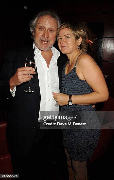 Nick Allott and television presenter Penny Smith attend the Harpers Bazaar dinner for George Clooney hosted by editor Lucy Yeomans, at L'Atelier de...