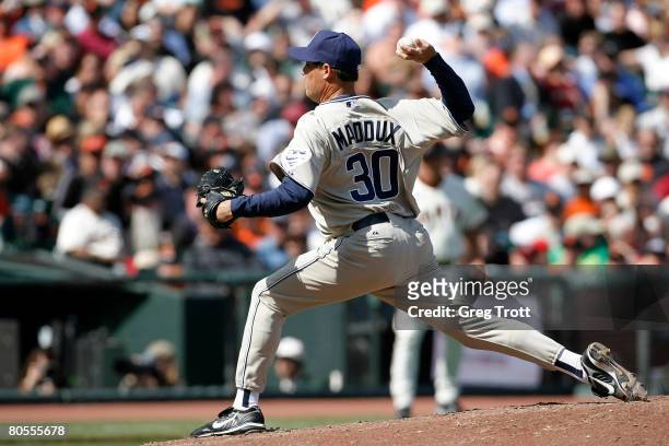 Pitcher Greg Maddux of the San Diego Padres picked up the win against the San Francisco Giants during the opening day game on April 7, 2008 at AT&T...
