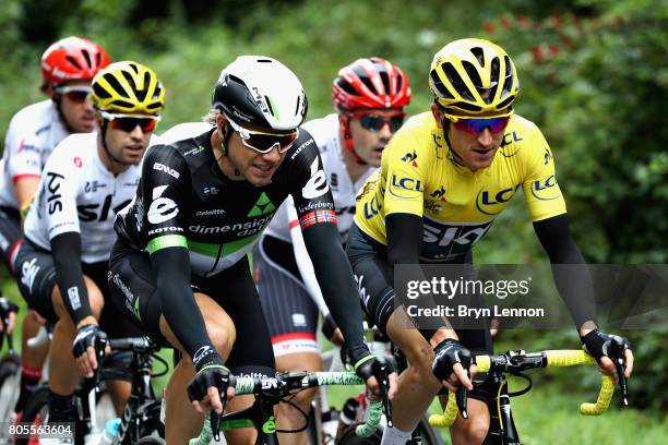 Geraint Thomas of Great Britain and Team Sky talks with Edvald Boasson Hagen of Norway and Team Dimension Data during stage two of the 2017 Tour de...