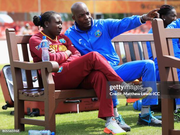 Vasbert Drakes, Coach of West Indies talks to Stafanie Taylor, captain of the West Indies, after their first innings during the ICC Women's World Cup...