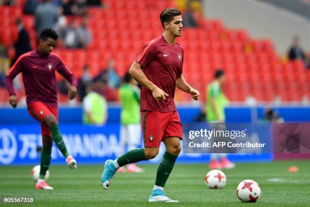 Portugal's forward Andre Silva warms up ahead of the 2017 FIFA Confederations Cup third place football match between Portugal and Mexico at the...