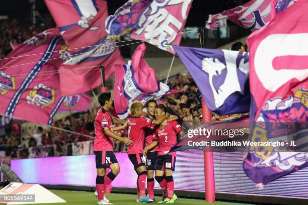 Riku Matsuda of Cerezo Osaka celebrates scoring his side's second goal with his team mates Kota Mizunuma , Yoichiro Kakitani and Kazuya Yamamura...