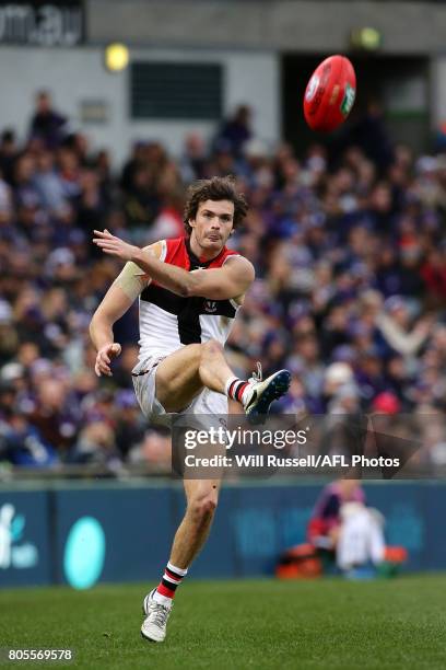 Dylan Roberton of the Saints kicks the ball during the round 15 AFL match between the Fremantle Dockers and the St Kilda Saints at Domain Stadium on...