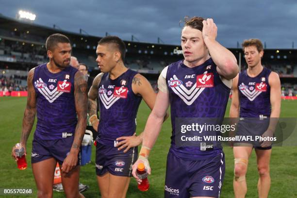 The Dockers leave the field after the teams defeat during the round 15 AFL match between the Fremantle Dockers and the St Kilda Saints at Domain...