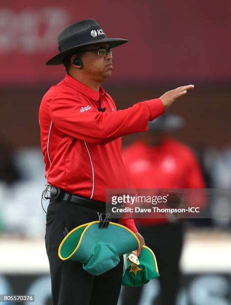 Umpire Shaun George signals a four during the ICC Women's World Cup match between India and Pakistan at The 3aaa County Ground on July 2, 2017 in...
