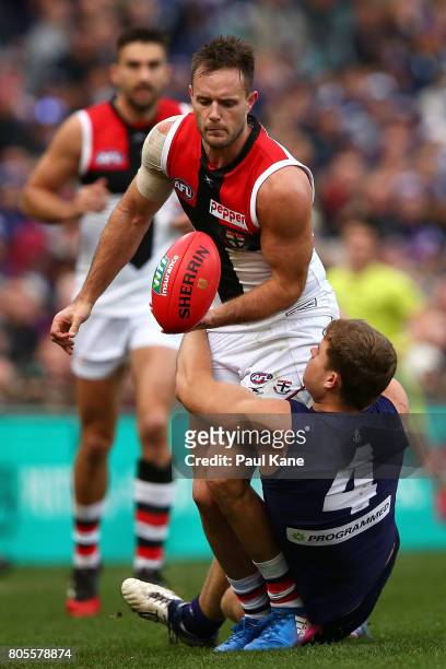 Sean Darcy of the Dockers tackles Nathan Brown of the Saints during the round 15 AFL match between the Fremantle Dockers and the St Kilda Saints at...