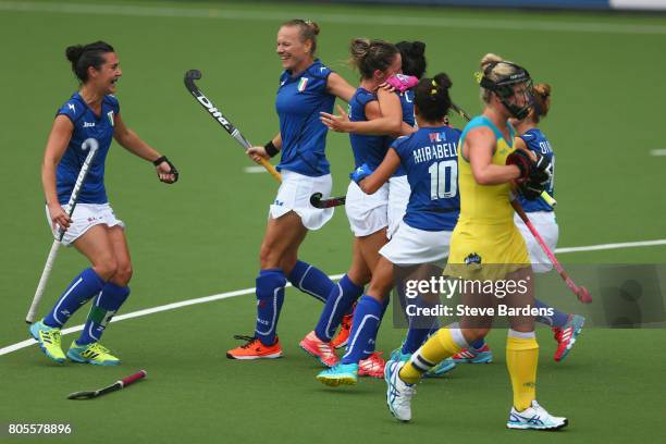 Federica Carta of Italy celebrates scoring a goal from a penalty corner with her team mates during the 5/6th place play off match between Italy and...