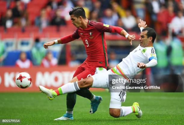 Rafael Marquez of Mexico fouls Andre Silva of Portugal and a penalty is awrded during the FIFA Confederations Cup Russia 2017 Play-Off for Third...