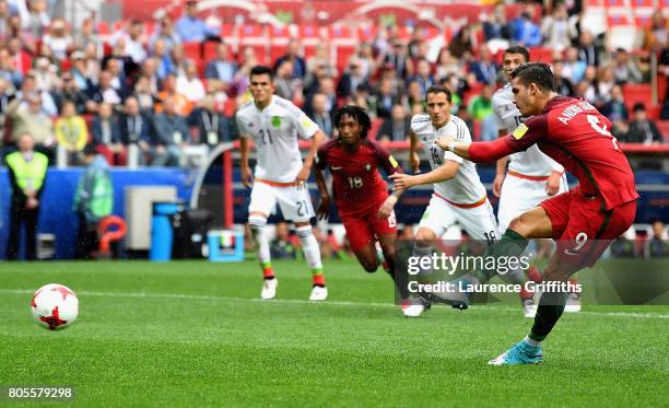Andre Silva of Portugal takes a penalty but it is saved by Guillermo Ochoa of Mexico during the FIFA Confederations Cup Russia 2017 Play-Off for...