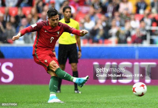 Andre Silva of Portugal takes a penalty but it is saved by Guillermo Ochoa of Mexico during the FIFA Confederations Cup Russia 2017 Play-Off for...