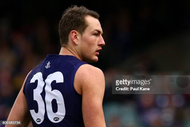 Brennan Cox of the Dockers looks on during the round 15 AFL match between the Fremantle Dockers and the St Kilda Saints at Domain Stadium on July 2,...