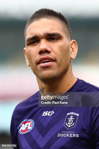 Michael Walters of the Dockers looks on while warming up during the round 15 AFL match between the Fremantle Dockers and the St Kilda Saints at...