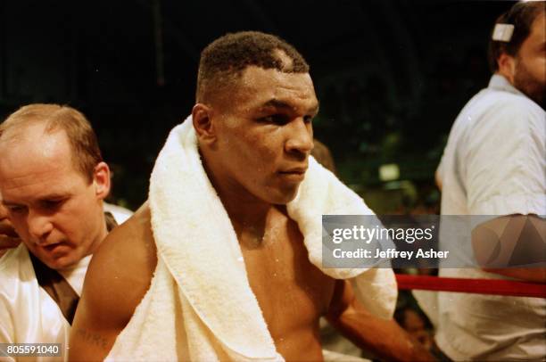 Boxer Mike Tyson and manager Kevin Rooney ringside at Tyson vs Holmes Convention Hall in Atlantic City, New Jersey January 22 1988.