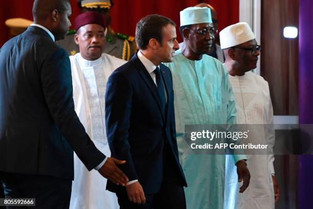 Niger's President Mahamadou Issoufou, French President Emmanuel Macron, Chad's president Idriss Deby Itno and Mali's President Ibrahim Boubacar...