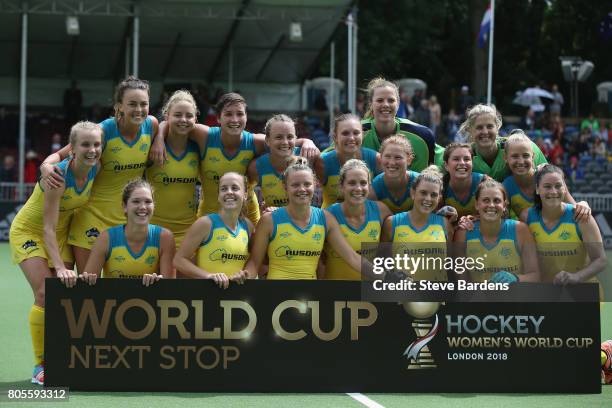 The Australia players celebrate their qualification for the 2018 World Cup after their victory over Italy in the 5/6th place play off match between...