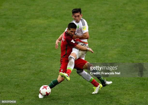 Joao Moutinho of Portugal and Hector Herrera of Mexico battle for possession during the FIFA Confederations Cup Russia 2017 Play-Off for Third Place...
