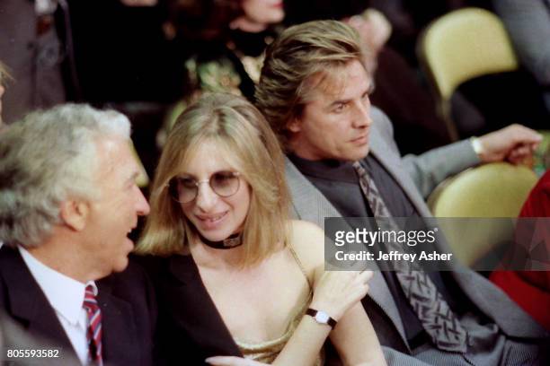 Barbra Streisand and Don Johnson ringside at Tyson vs Holmes Convention Hall in Atlantic City, New Jersey January 22 1988.