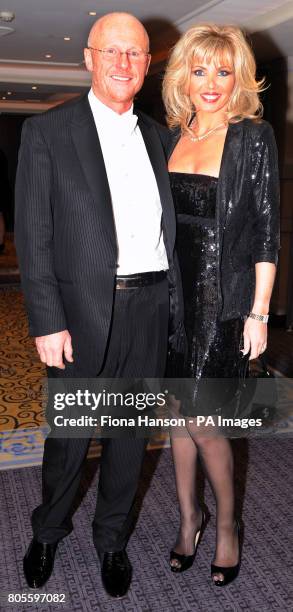 Entrepreneur John Caudwell and Claire Johnson arrive at the Growing Business Awards, Marriott Grosvenor Square Hotel, London.