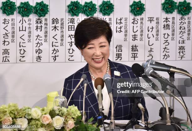 Tokyo Governor Yuriko Koike who currently is the leader of the newly-formed Tomin First no Kai party, smiles as she holds a press conference in Tokyo...