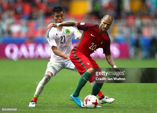 Luis Reyes of Mexico and Ricardo Quaresma of Portugal battle for possession during the FIFA Confederations Cup Russia 2017 Play-Off for Third Place...
