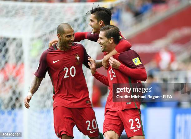 Adrien Silva of Portugal celebrates scoring his sides second goal with Andre Silva of Portugal and Ricardo Quaresma of Portugal during the FIFA...