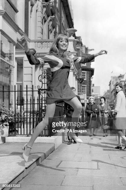 Model Patti Boyd shows a very short dress named 'Hoopla' in London's West End. It was one of the Quorum Autumn Collection, designed by Ossie Clark,...