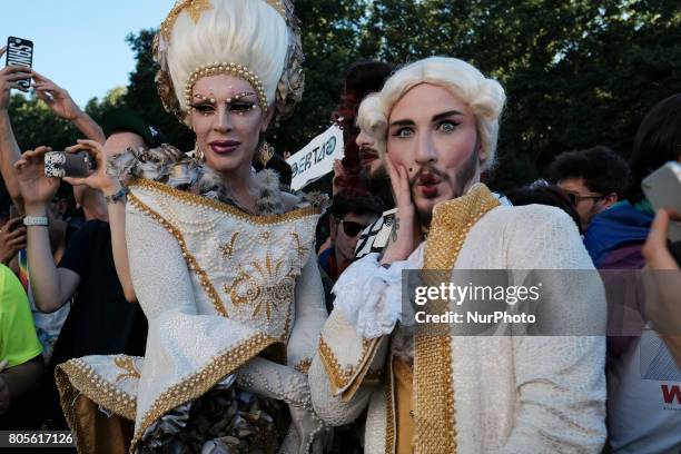 Participants gather at during the WorldPride 2017 parade in Madrid on July 1, 2017. Revellers took to the rainbow streets of Madrid today in the...