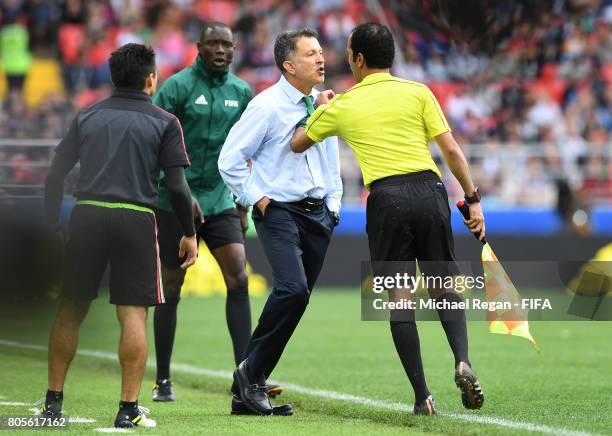 Juan Carlos Osorio, head coach of Mexico confronts the fourth offical during the FIFA Confederations Cup Russia 2017 Play-Off for Third Place between...