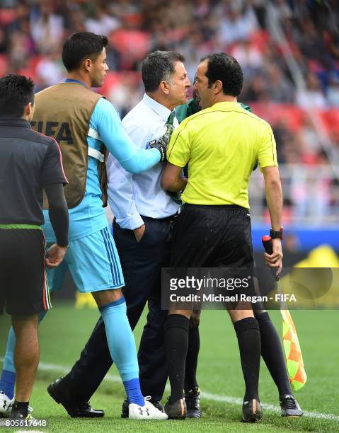 Juan Carlos Osorio, head coach of Mexico confronts the fourth offical during the FIFA Confederations Cup Russia 2017 Play-Off for Third Place between...