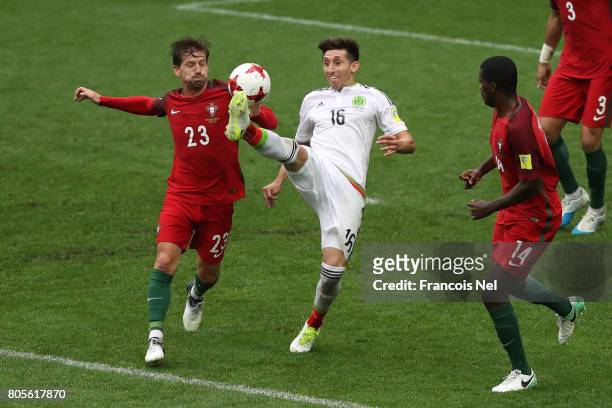 Adrien Silva of Portugal and Hector Herrera of Mexico battle for possession during the FIFA Confederations Cup Russia 2017 Play-Off for Third Place...