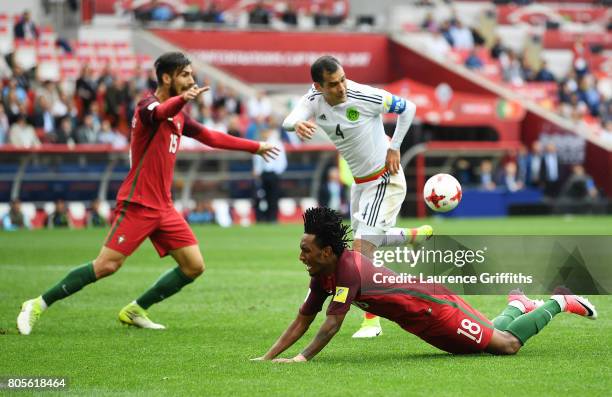 Rafael Marquez of Mexico fouls Gelson Martins of Portugal in the box during the FIFA Confederations Cup Russia 2017 Play-Off for Third Place between...