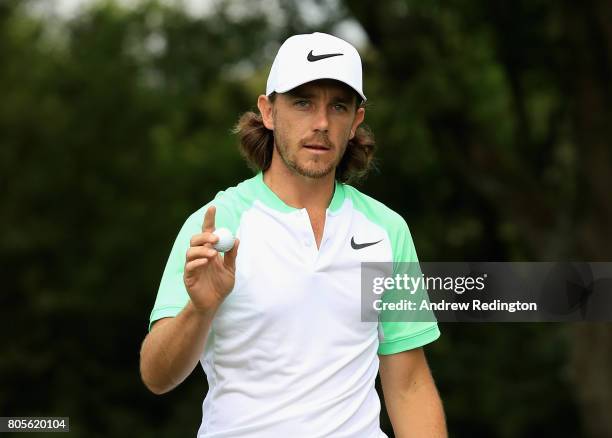 Tommy Fleetwood of England celebrates a berdie on the 13th green during day four of the HNA Open de France at Le Golf National on July 2, 2017 in...