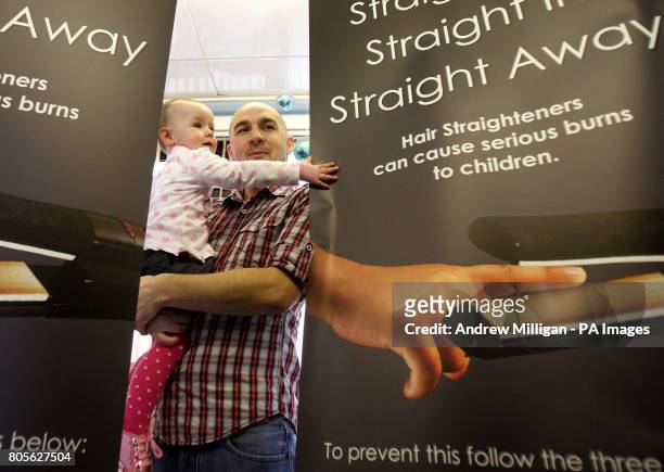 Eighteen-month-old Kayla Murray with her dad Paul McGee at Glasgow's Royal Hospital for Sick Children as he and Kayla's mother Michelle Murray are...